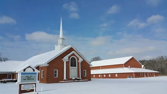 Elmwood’s brick church building and steeple in winter